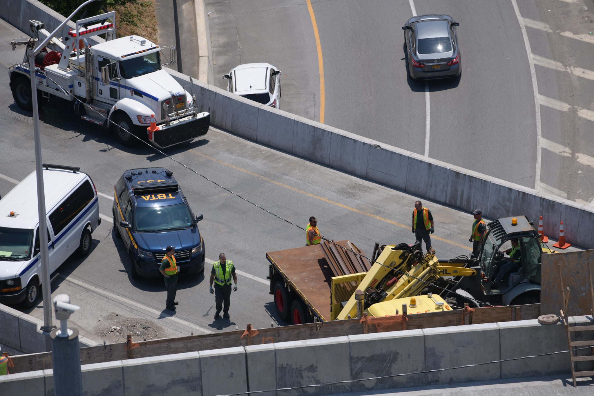 Flatbed commercial truck rolled over on NY highway