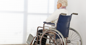 lonely senior woman in a wheelchair