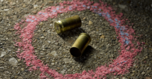 Bullets on ground with chalk drawn around