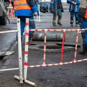 workers repairing a manhole