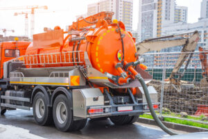 Orange sanitation truck in New York City