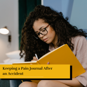 woman writing in pain journal to keep track of her symptoms after an accident