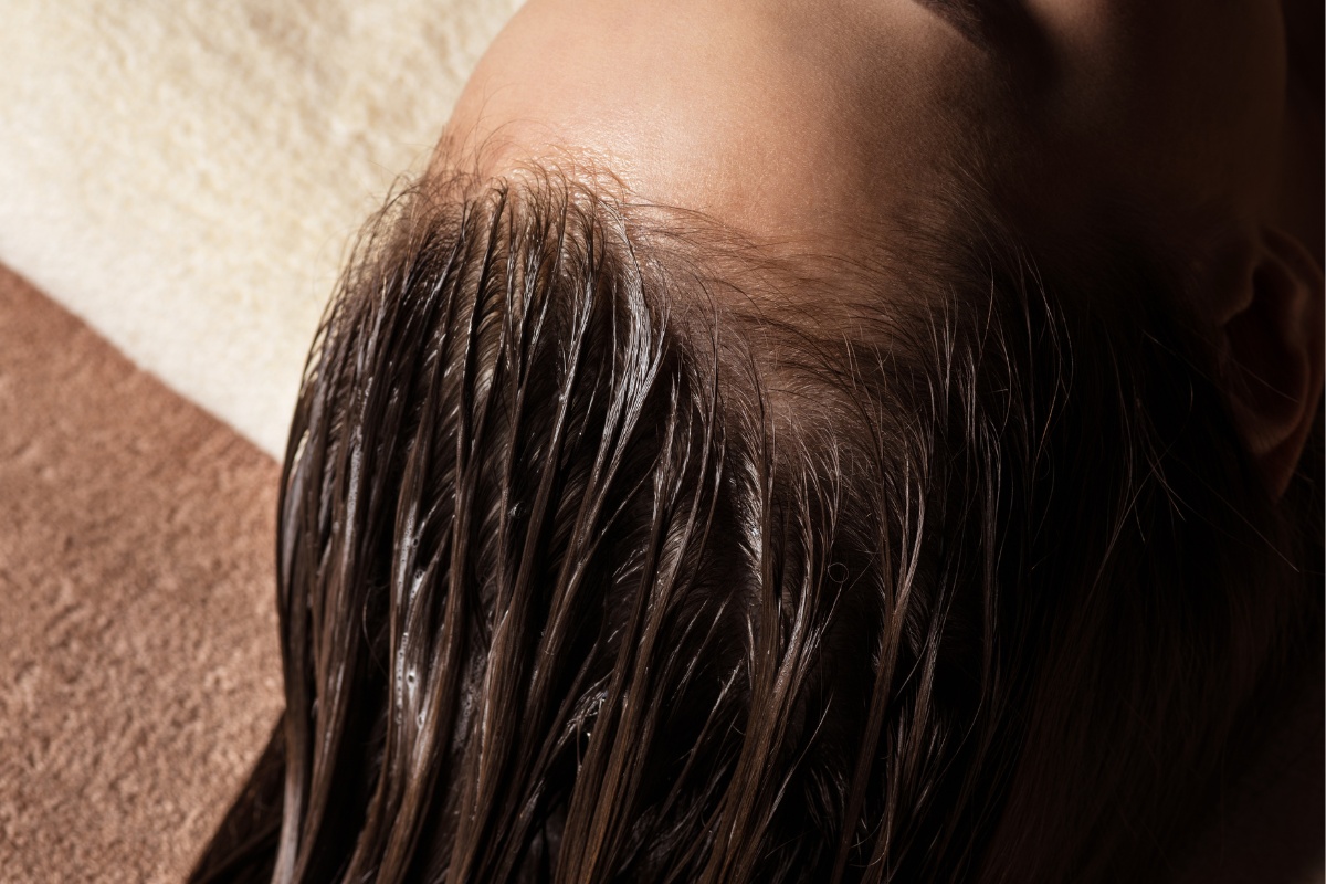 Woman receiving a hair treatment