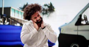 Man experiencing neck pain after a car accident in Brooklyn